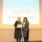 Cathy Gormal receiving honorary membership from CILIPS President Jeanette Castle