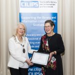 Elspeth Scott receiving honorary membership from CILIPS President Liz McGettigan