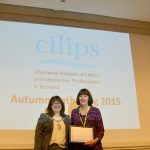 Yvonne Manning receiving honorary membership from CILIPS President Jeanette Castle