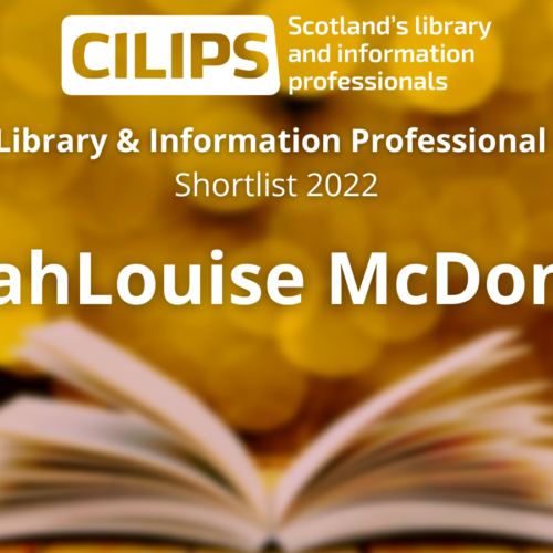 The Scotland's Library & Information Professional of the Year Award logo, with a gold background and an open book, reading 'Shortlist - SarahLouise McDonald'.
