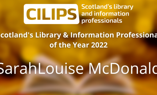 The Scotland's Library & Information Professional of the Year 2022 logo, with white text in front of a gold library book background, reading SarahLouise McDonald.