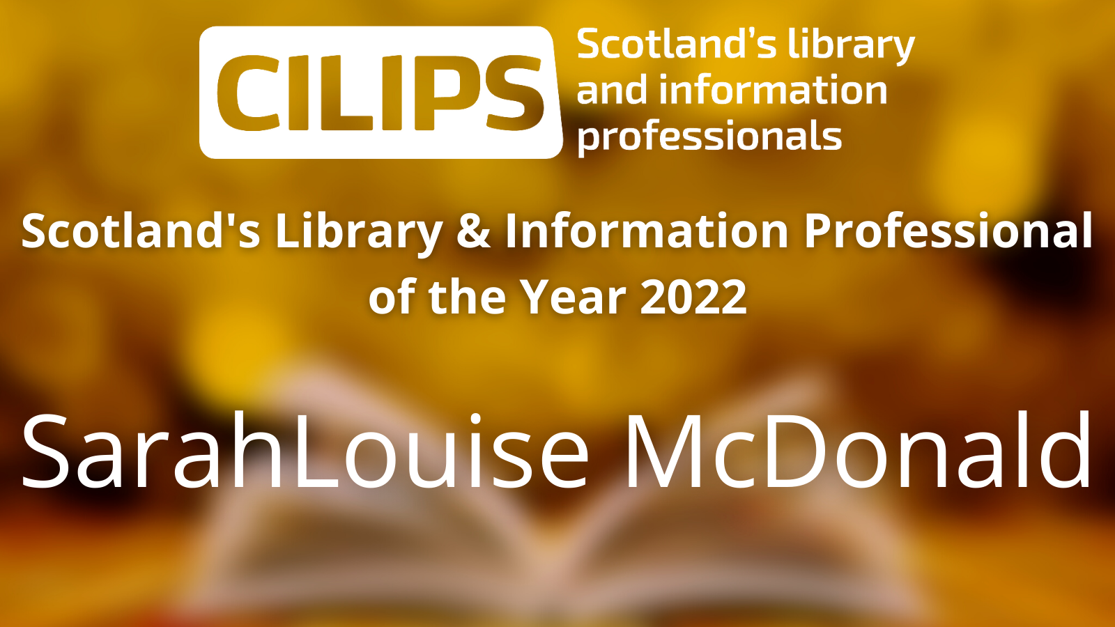 The Scotland's Library & Information Professional of the Year 2022 logo, with white text in front of a gold library book background, reading SarahLouise McDonald.