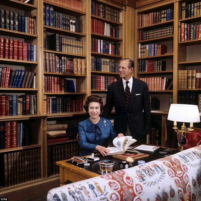 HM Queen Elizabeth II and Prince Philip in Balmoral Library.