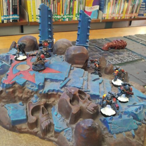 A Dungeons and Dragons library tabletop set up.